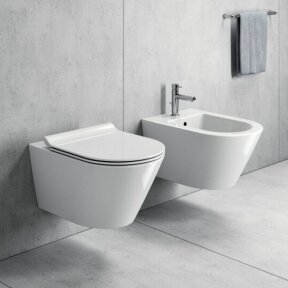 Matinis baltas WC KUBE X 55x36 Swirlflush® Dualglaze® su Soft Close dangčiu, GSI